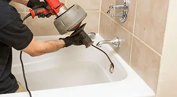 Устранение засора ванны
